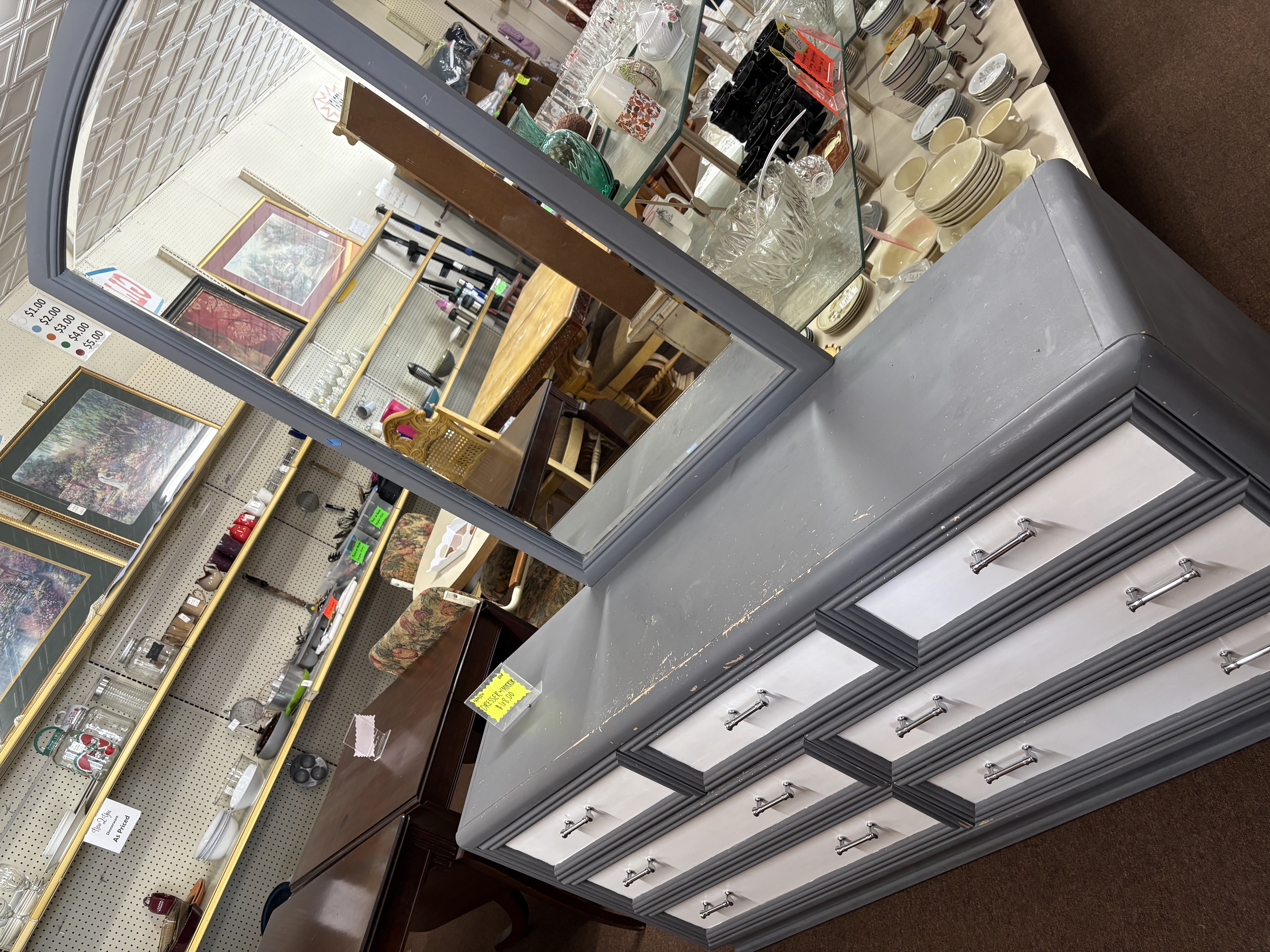 Gray dresser with mirror and chrome hardware