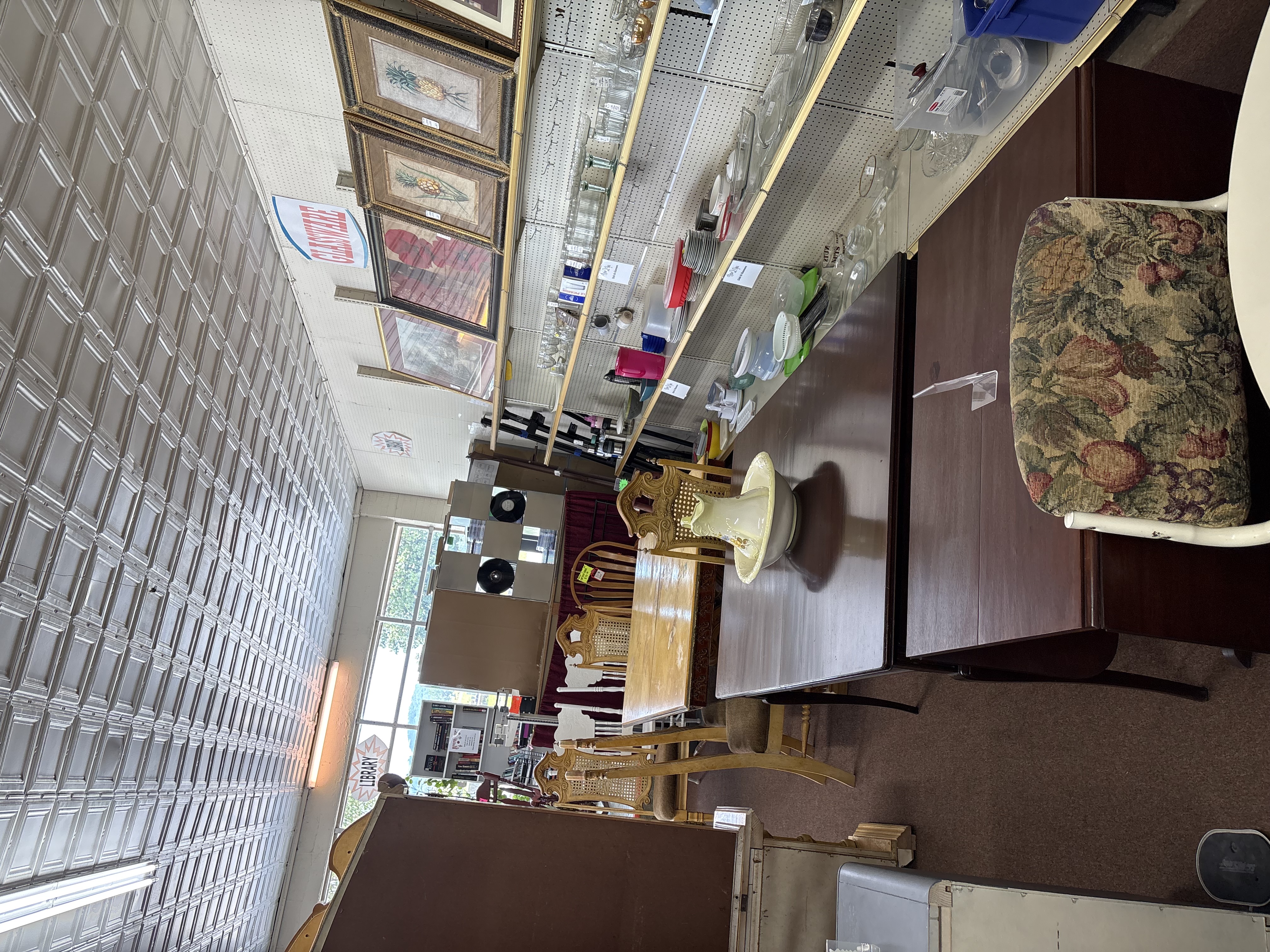 Store interior with furniture and pictures